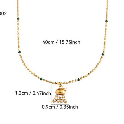 Gold necklace with measurements on a white background